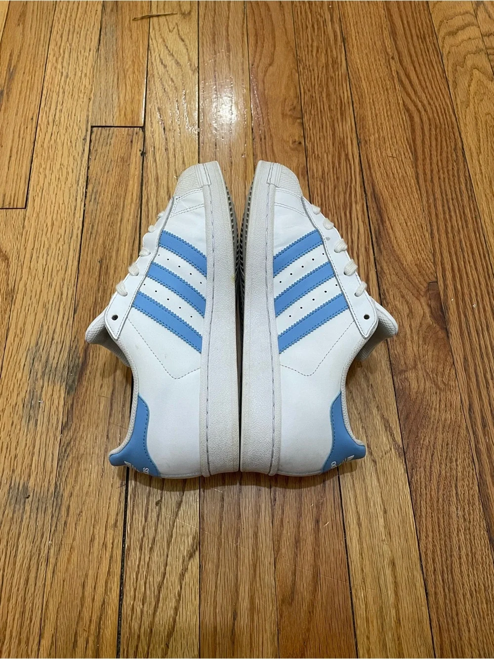 adidas Superstar Men’s Sneakers in White with Light Blue Stripes